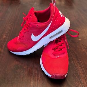 Red Nikes size 7 Y. Fits like size 9 in womens.